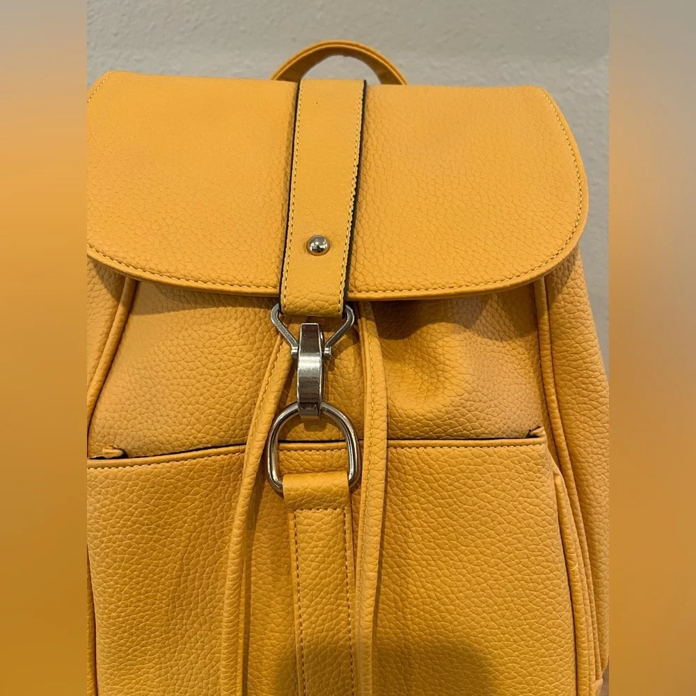 Yellow Textured Pleather Backpack with Silver Clasp